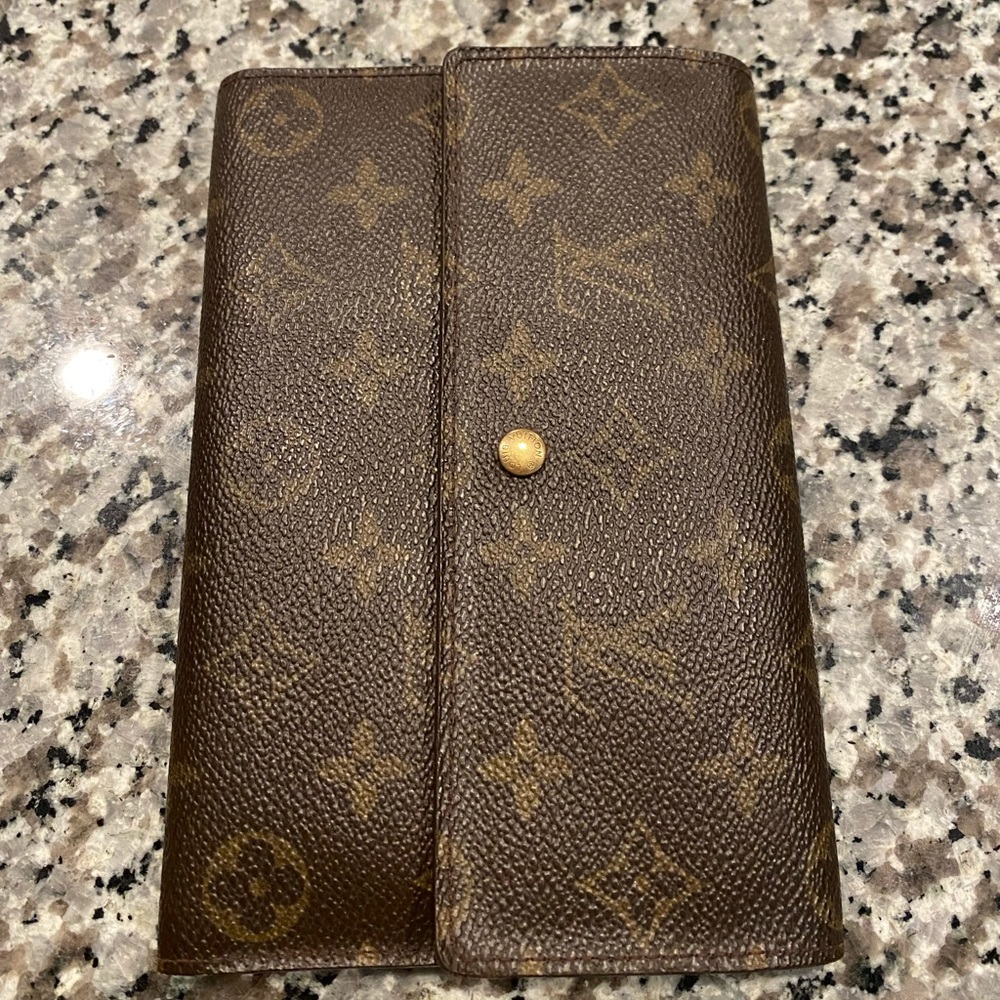 Vintage Louis Vuitton wallet.